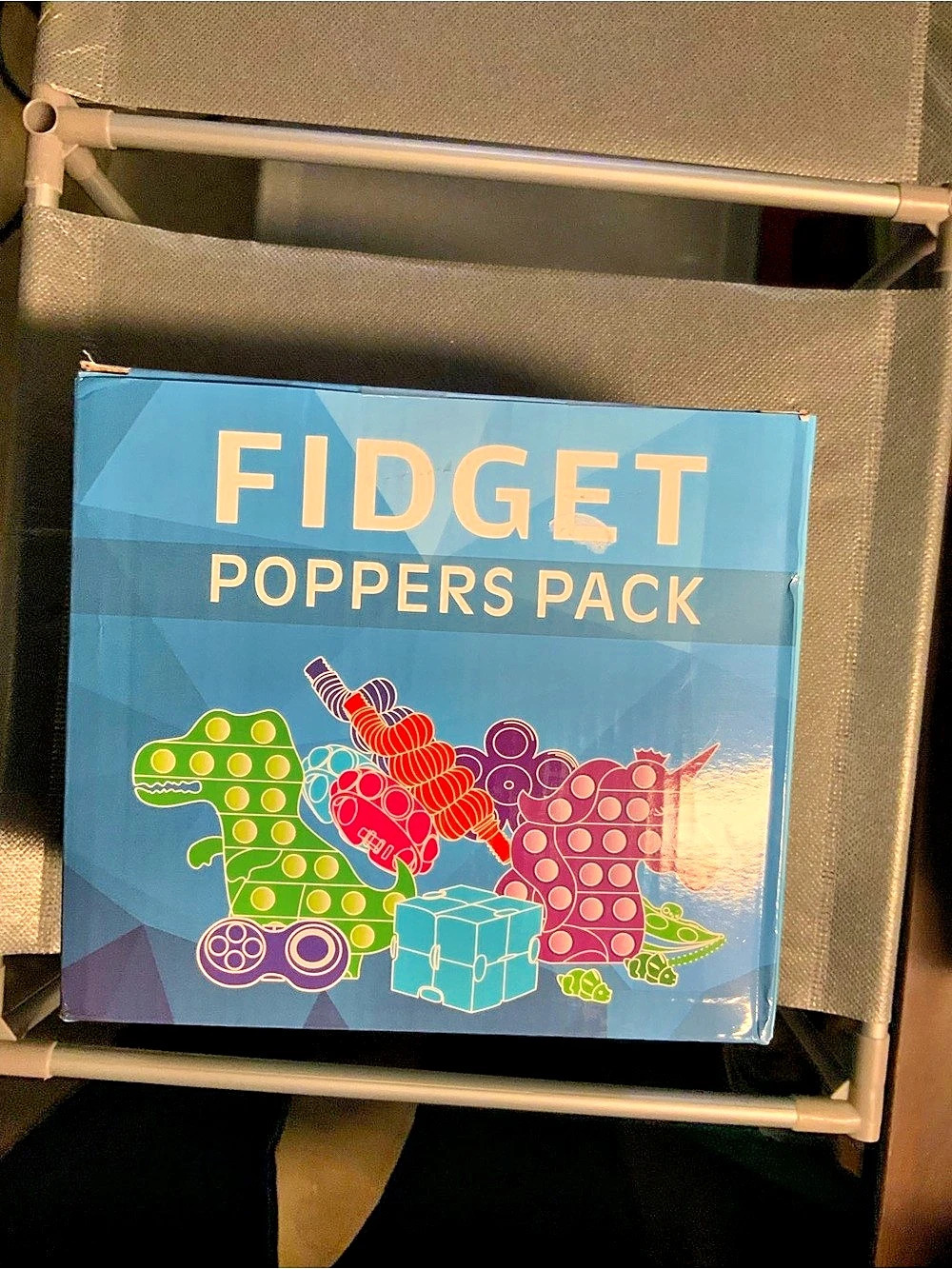 Box of various fidget toys